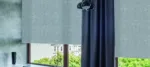 Elegant grey patterned blinds in modern room.