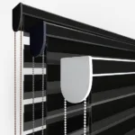 Close-up of modern black venetian blinds with control chains.