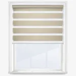 Beige striped roller blind on white window frame.