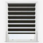 Modern zebra blind in a white window frame.
