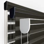 Close-up of roller blinds with chain controls.