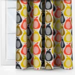 Colourful retro patterned curtains in a modern room setting.