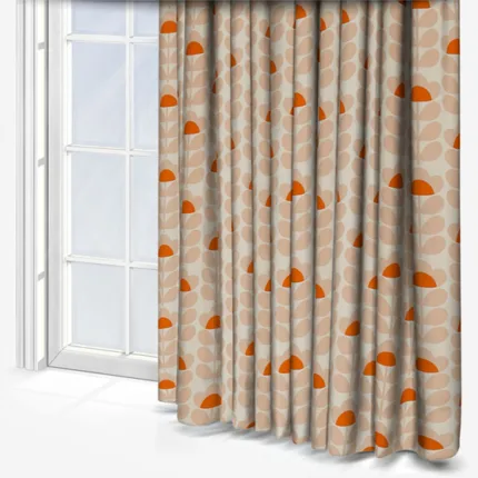 Patterned curtains beside a bright window.