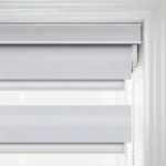 Grey zebra roller blind in white interior