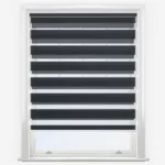 Modern white window with black zebra blinds.