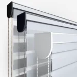 Mechanical blinds with chain controls on white background.