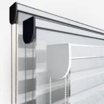 Close-up of modern roller blinds with chain mechanism