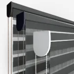 Close-up view of modern window roller blind mechanism.