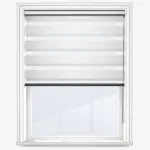 Modern white zebra blind on window, isolated on white.