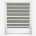 Modern grey zebra blind in white window frame