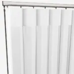 White vertical blinds on a metal track