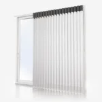 Vertical blinds covering window on white background.