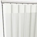 White vertical blinds on a track system.