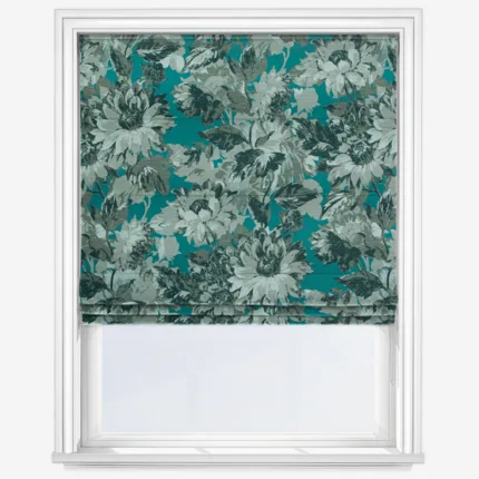Teal floral patterned roller blind in white window frame.