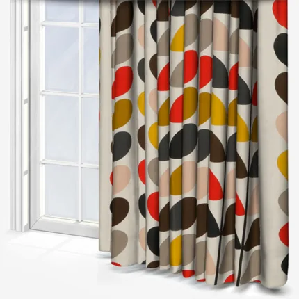 Colourful abstract-patterned curtains beside a white window.