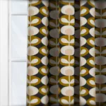 Retro patterned curtains with window backlighting.