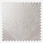 White lace pattern on grey fabric swatch.