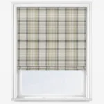 Plaid window shade on white window frame.
