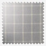 Grey tartan fabric swatch with zigzag edges.