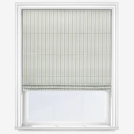 Striped blinds on modern white window frame.