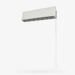 Floating metallic accordion with string on white background.
