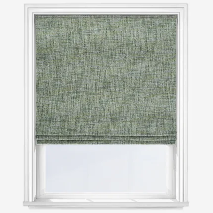 Green fabric roller blind on white window frame.