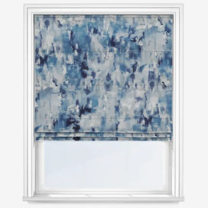 Abstract blue patterned roller blind in window frame.