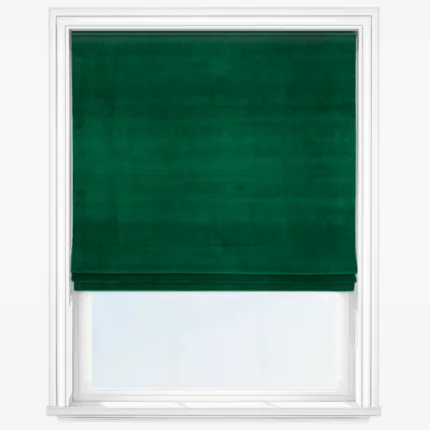 Green roller blind in white window frame