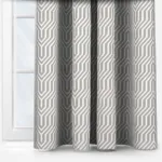 Geometric patterned curtains in sunlit room
