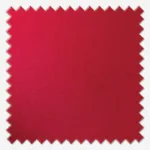 Red fabric swatch with serrated edges.