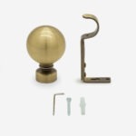 Brass door knob and handle installation kit on white.