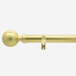 Brass curtain rod with ball finial and bracket.
