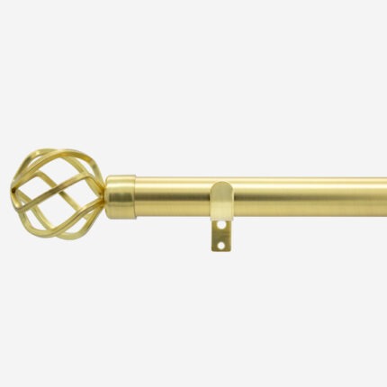 Gold curtain rod with geometric finial on white background.