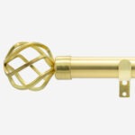 Gold curtain rod with ornate finial and bracket.
