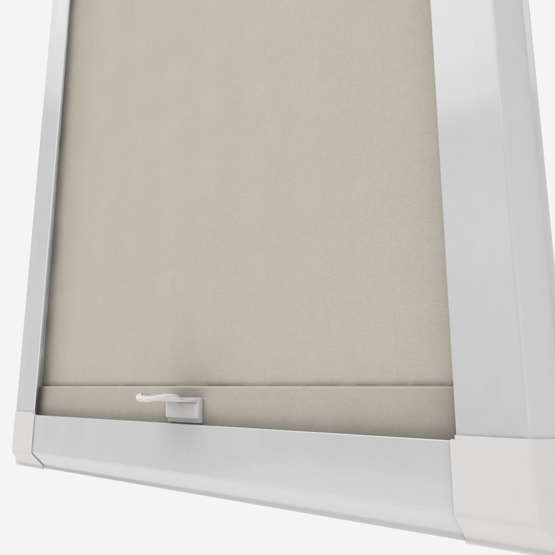 Beige roller blind in white window frame