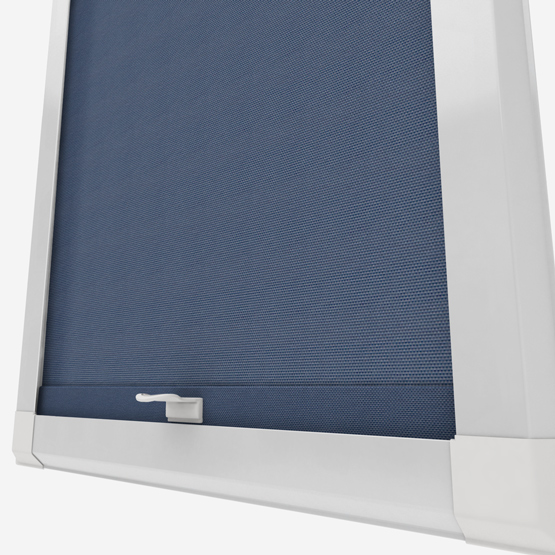 Blue roller blind in white window frame