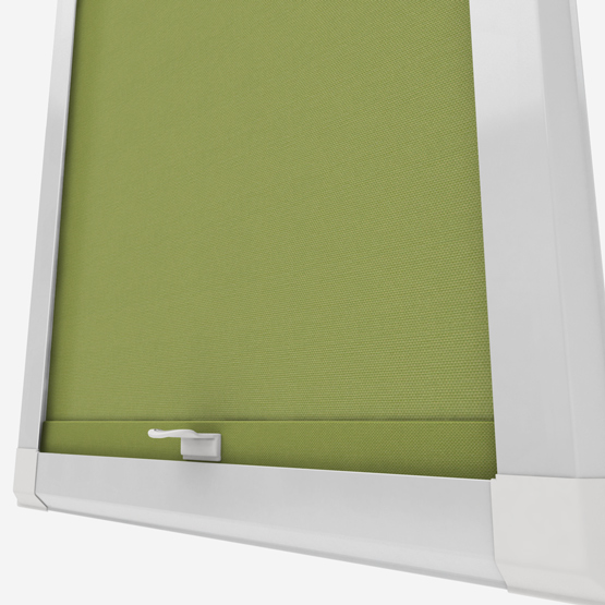 Green roller blind in white window frame