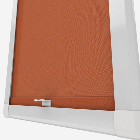 Orange roller blind in white window frame