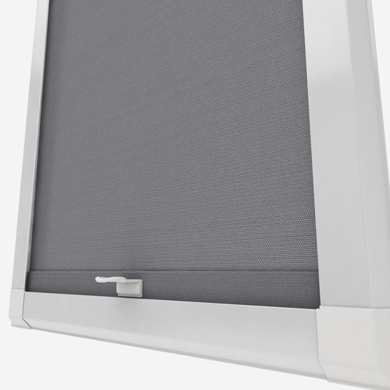 Grey roller blind in white window frame