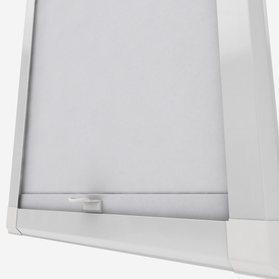 Close-up of a white roller blind on window